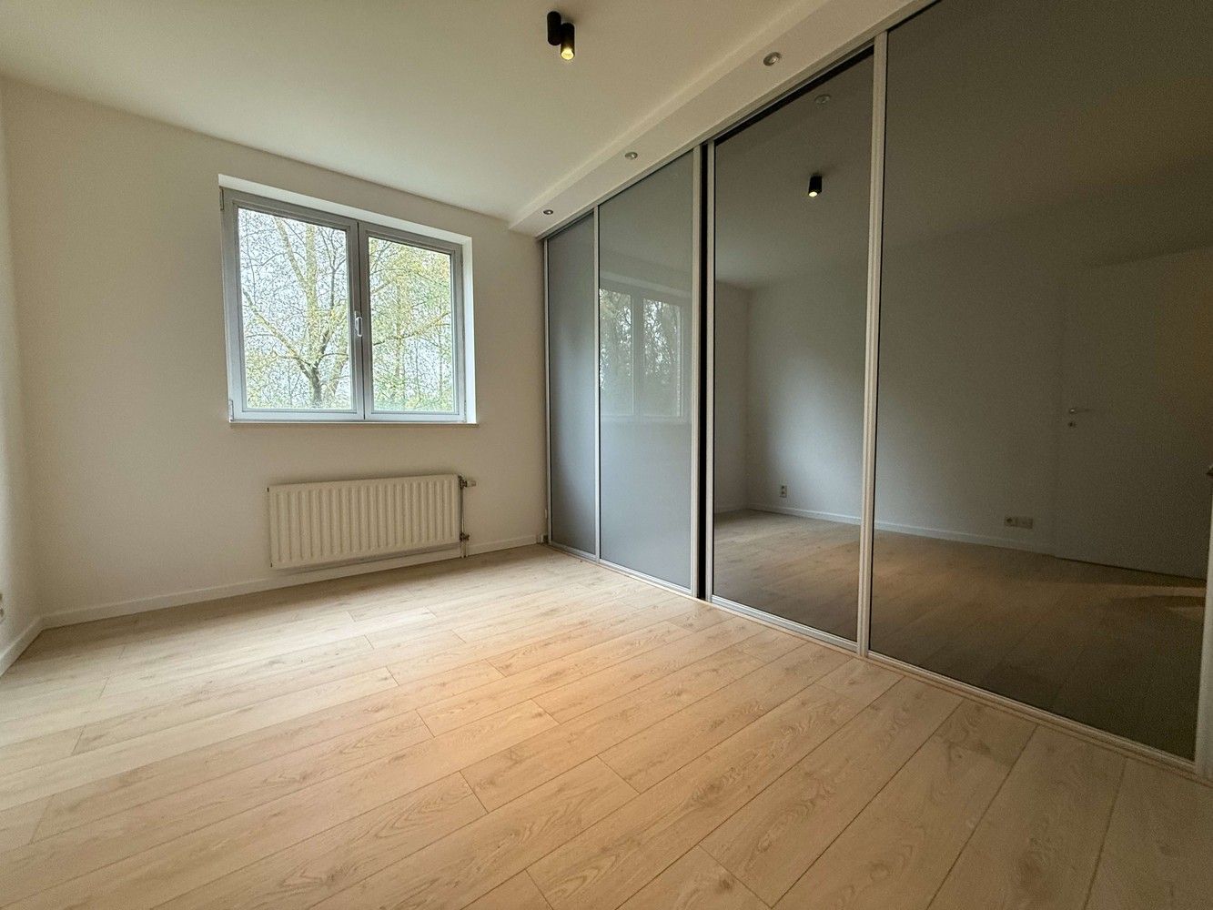 Instapklaar appartement met 2 slaapkamers en binnenstaanplaats in groene omgeving vlakbij Leuven foto 13