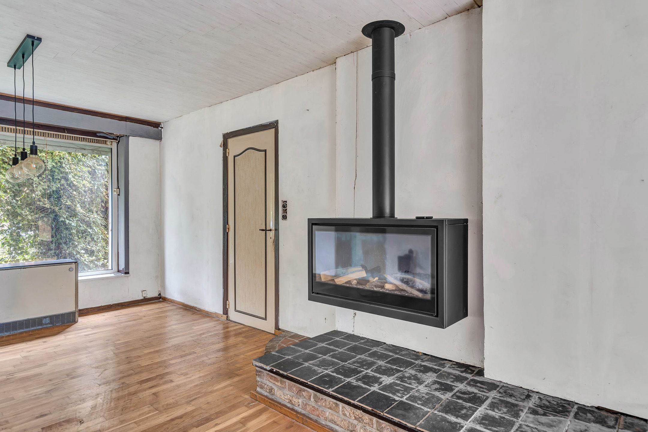 Renovatiewoning met vernieuwd dak en ramen in Lochristi foto 4
