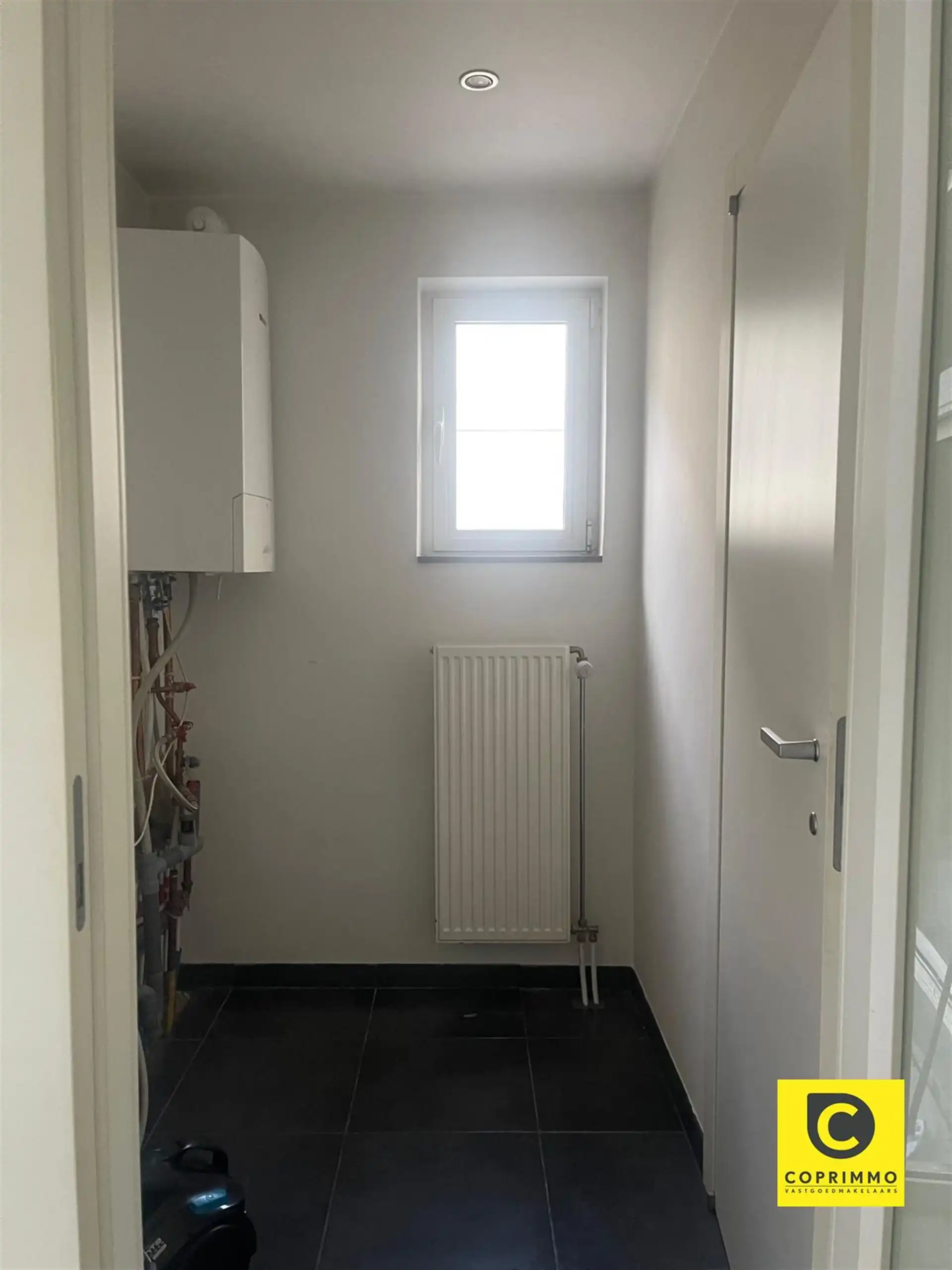 Te renoveren souterrain met stadskoer, achterhuis en garage op 't Zuid! foto 30
