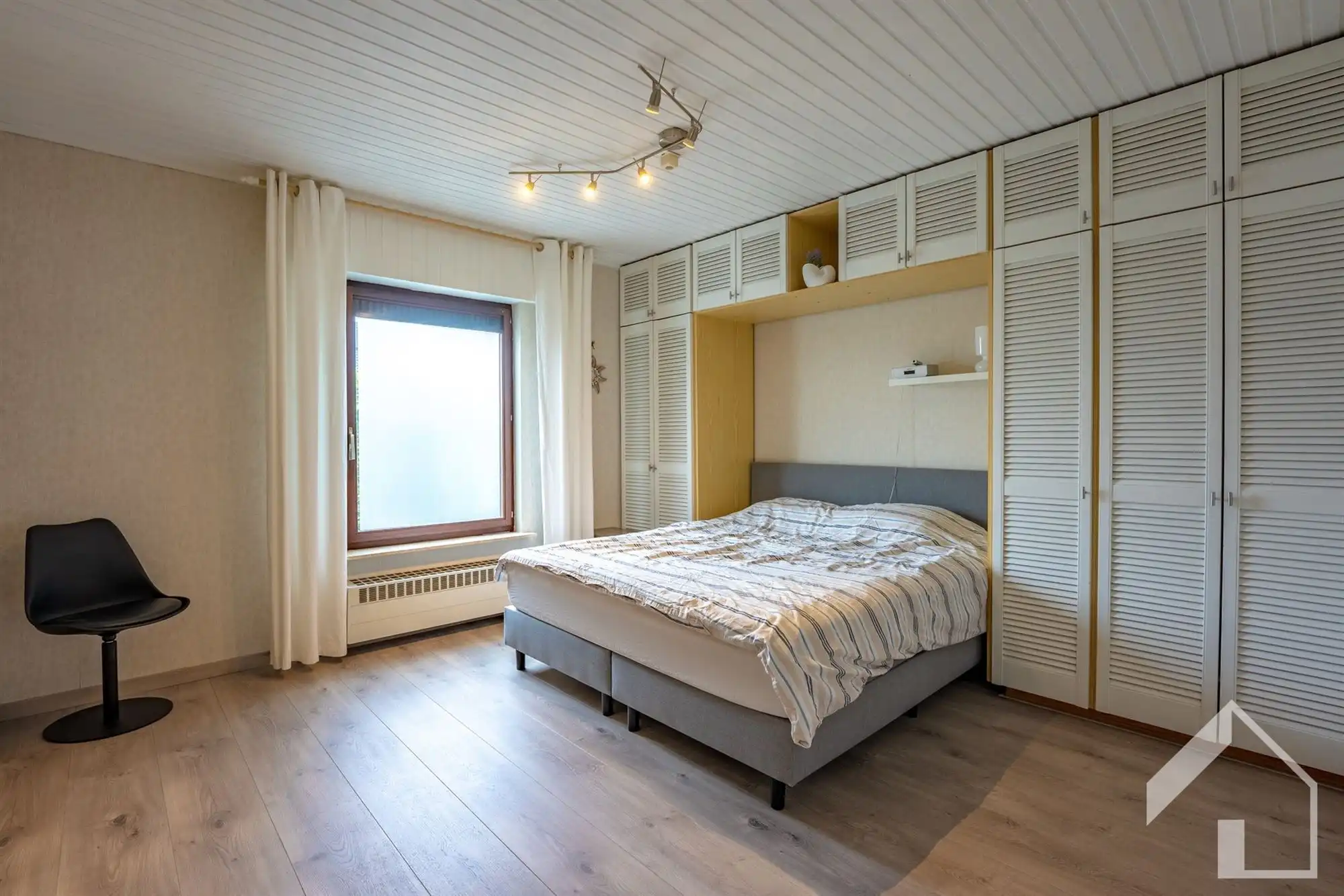Ruime gelijkvloerse woning met 3 slaapkamers en garage foto 10