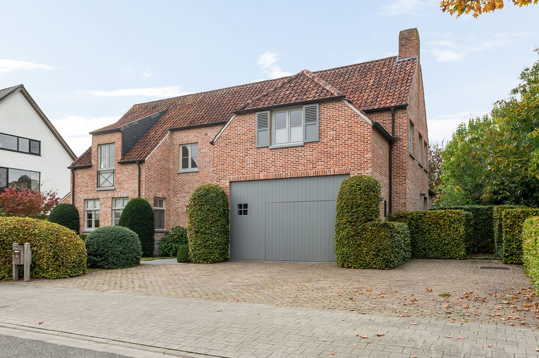 Uitzonderlijk mooie en recente woning op schitterend perceel foto 2