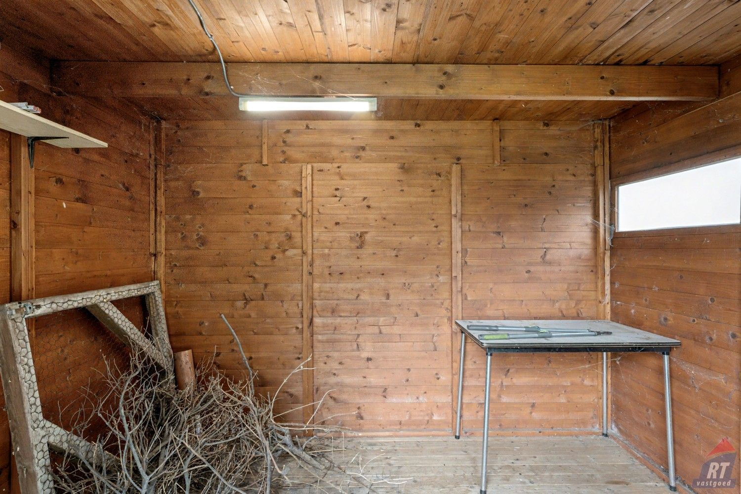 Gelijkvloerse halfopen woning met tuin en renovatiepotentieel in het hart van Sint-Truiden foto 16