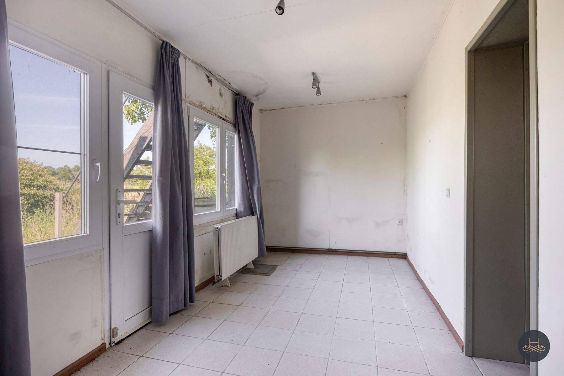 Op te knappen woning met uitzicht op de Dijle te Rotselaar foto 9