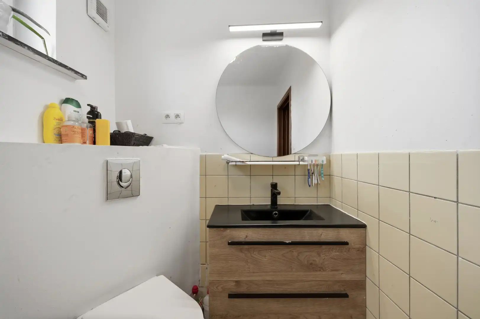 Instapklare rijwoning in een rustige straat te Tienen foto 18