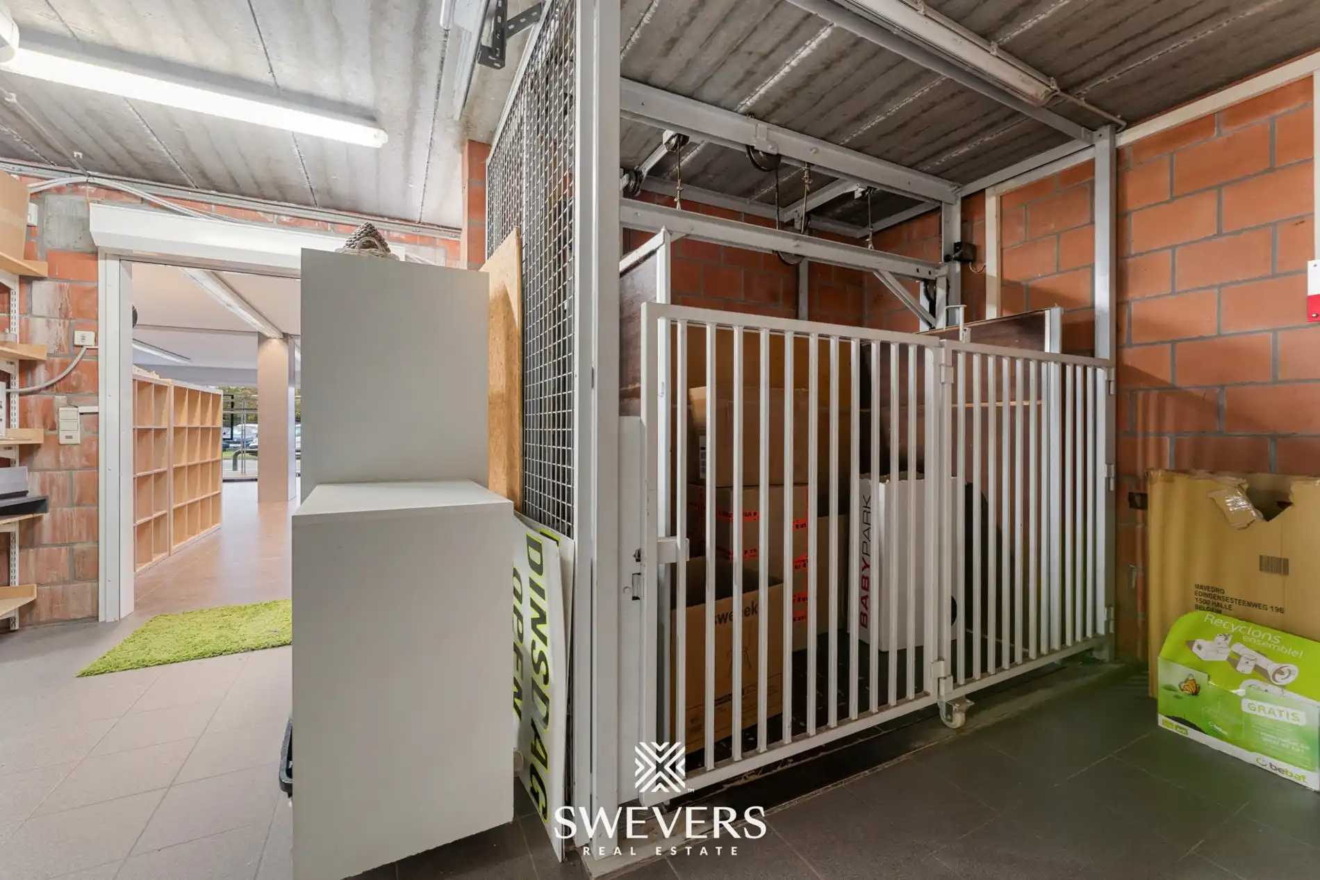 Opbrengsteigendom met handelspand, ruim appartement en uitbreidingspotentieel in hartje Heusden-Zolder foto 14