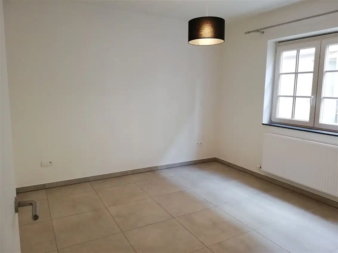 Gelijkvloers app. met 2 slpk., terras en garage, rustigere ligging foto 12