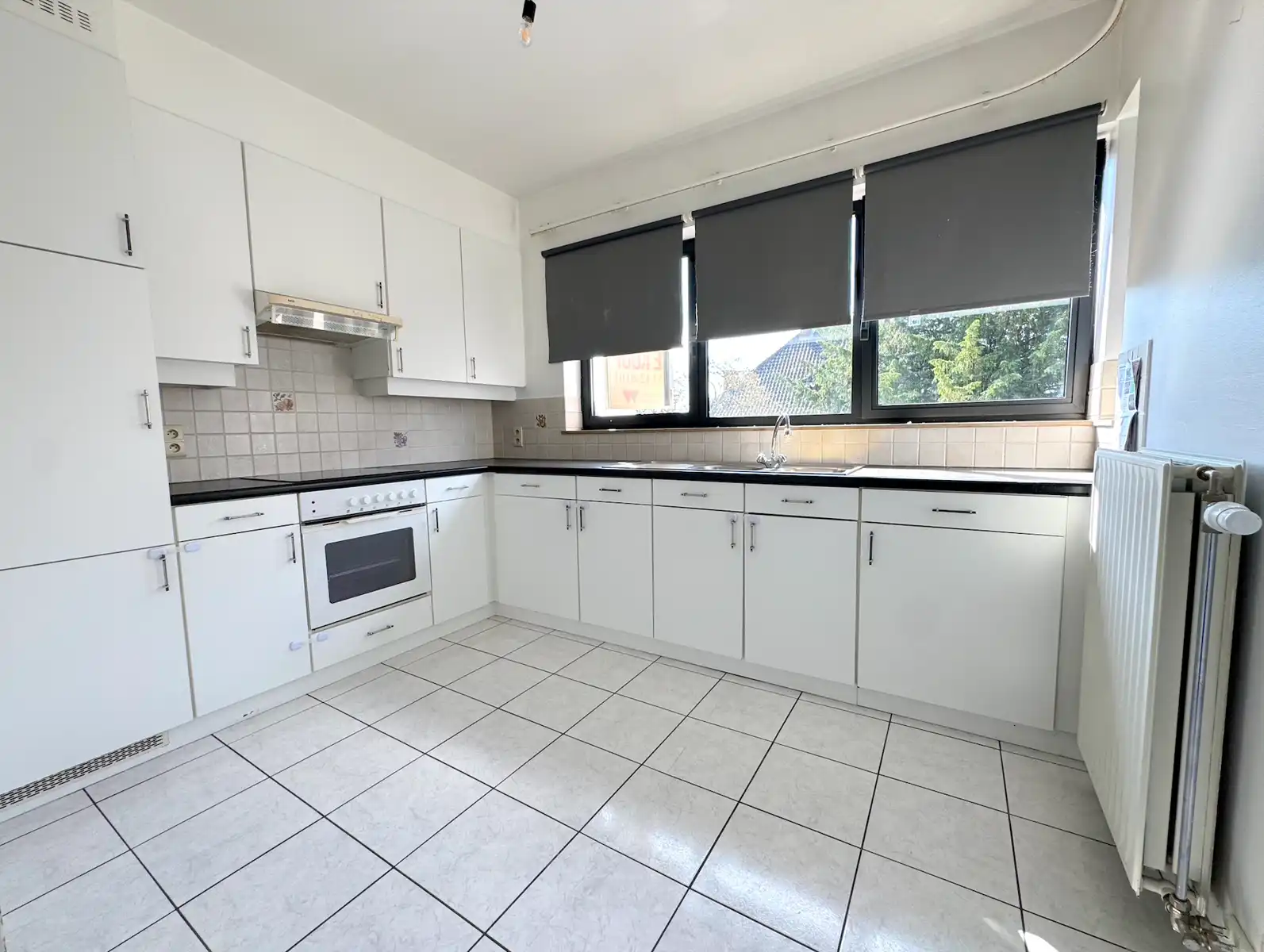 Instapklaar appartement met 2 slaapkamers én garage! foto 9