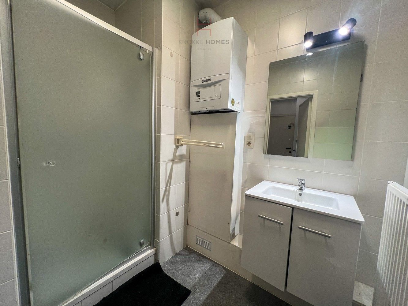 Ruim 2-kamerappartement in het centrum van Heist foto 18