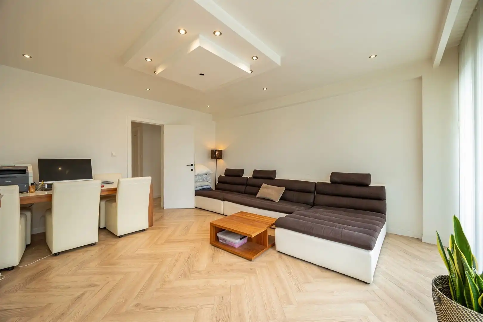 Ruim opbrengsteigendom met lift, garage en verhuurde handelsruimte foto 14