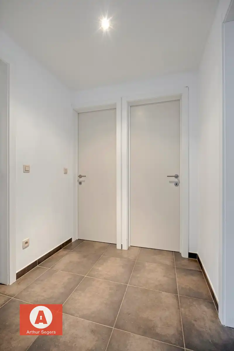 Energiezuinig appartement + autostaanplaats + kelder-berging foto 14