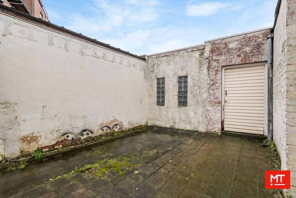 Op te frissen woning met 3 slaapkamers, stadskoer en dubbele garage in het centrum van Roeselare foto 14