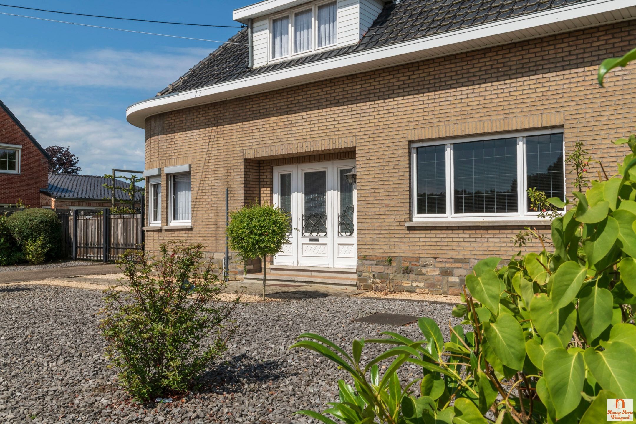 Sfeervolle jaren ’60-woning met grote tuin in rustige straat foto 32