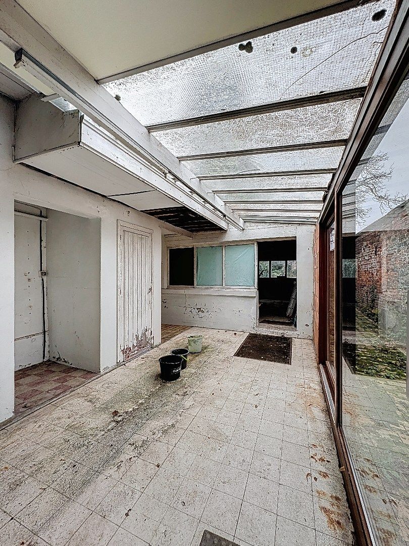 Charmant pand met handelsruimte en woonst in hartje Tienen foto 7