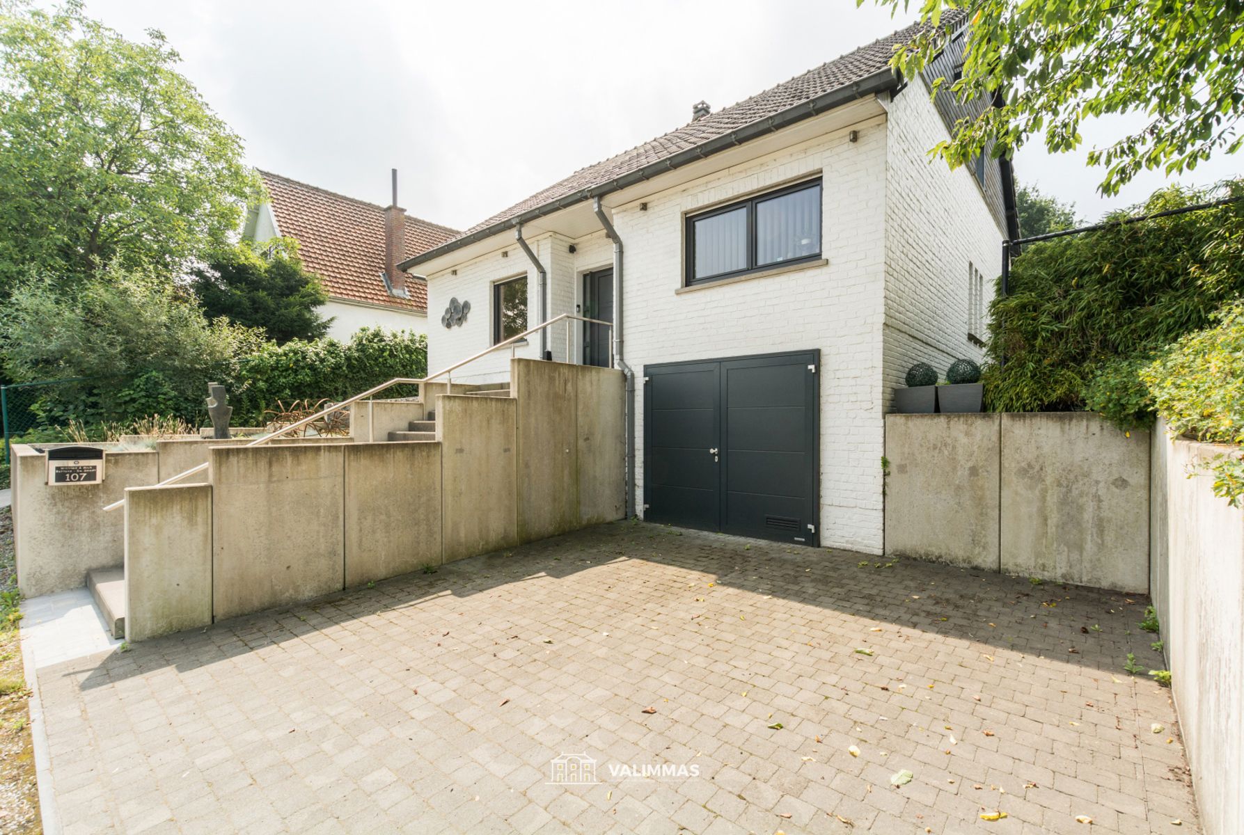 Ruime, verzorgde & instapklare woning OB met garages en tuin foto 7