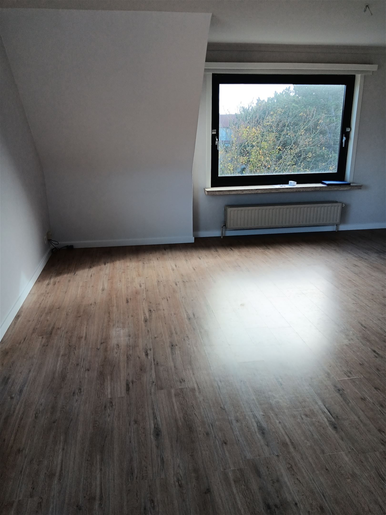 Jaarbasis 2-kamer appartement inclusief garage foto 4