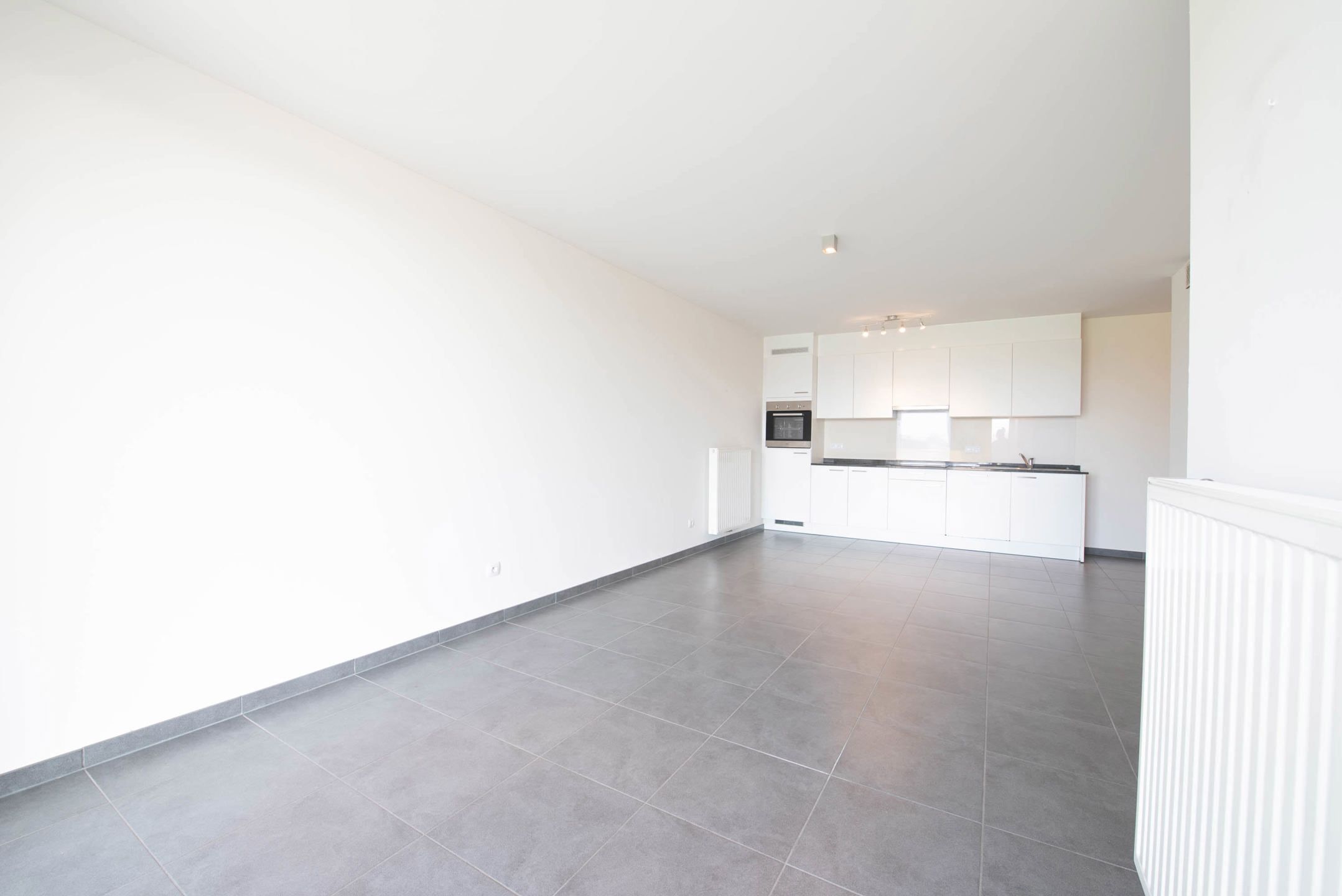 Serviceflat met autostandplaats & kelderberging foto 6