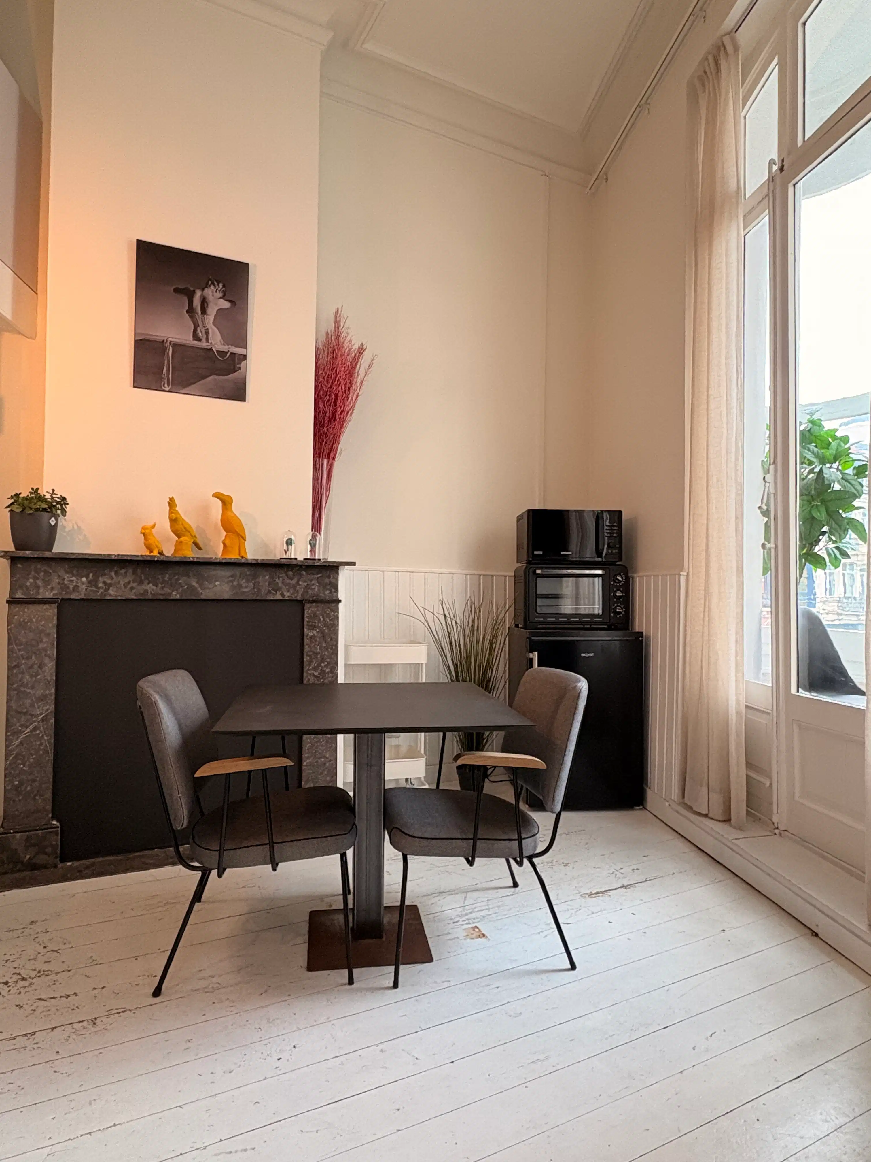 Handelspand met drie studio’s te koop op topligging in Gent foto 8