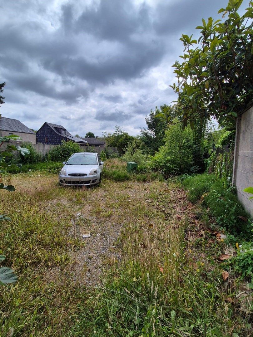 Handelshuis met perceel grond te Genk foto 14