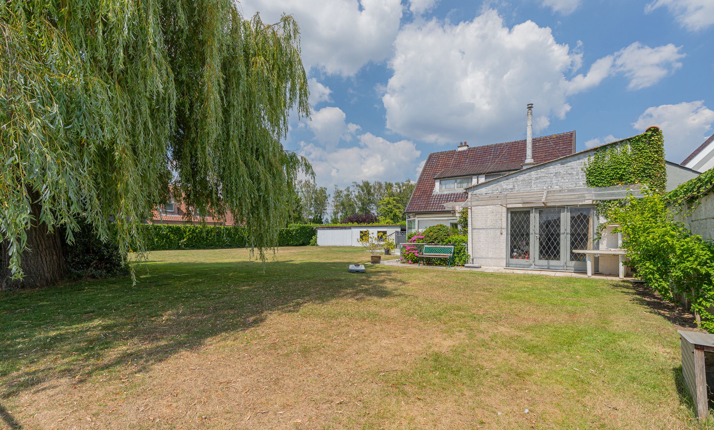 AALST – Halfopen bebouwing met villa-allure op 3114 m² foto 22
