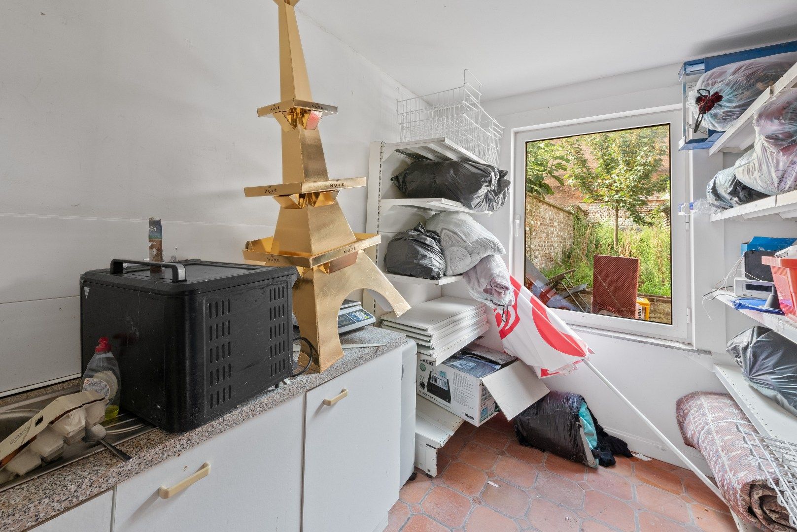 Opbrengsteigendom met 2 appartementen en een handelspand in het hart van Tienen foto 8