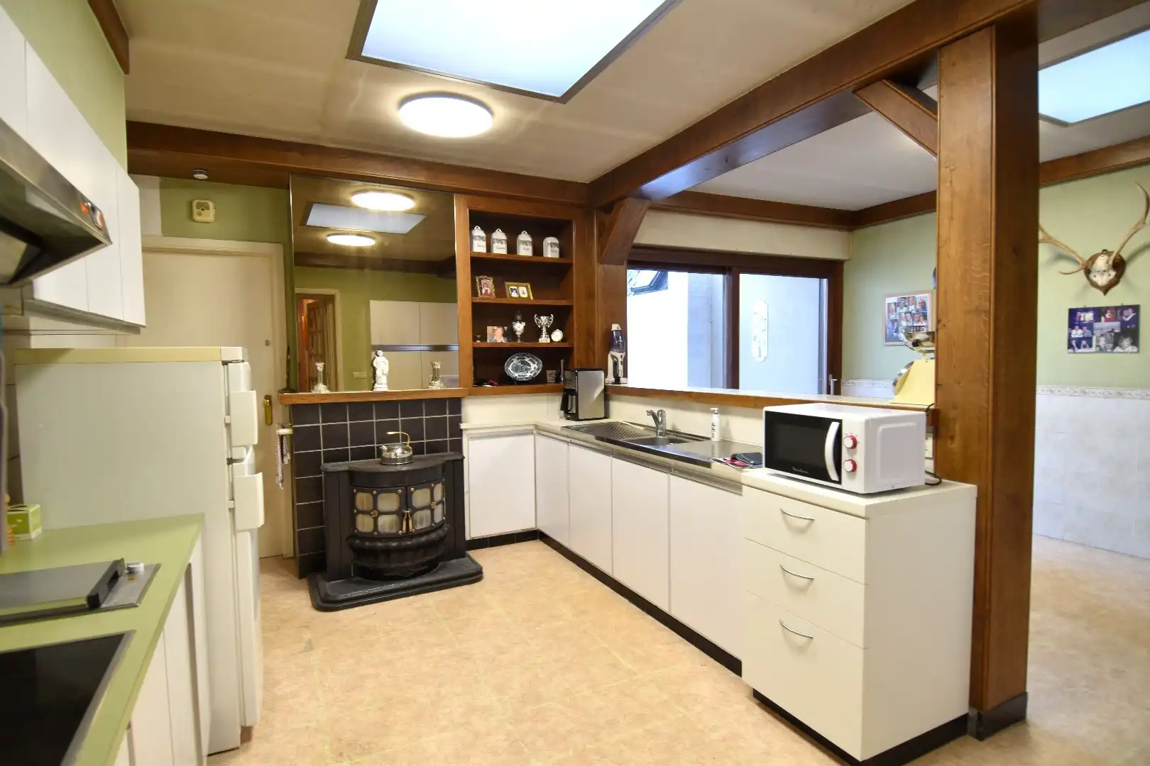 Sfeervolle gezinswoning met 4 slaapkamers, garage én tuin te koop in Kuurne-centrum foto 10