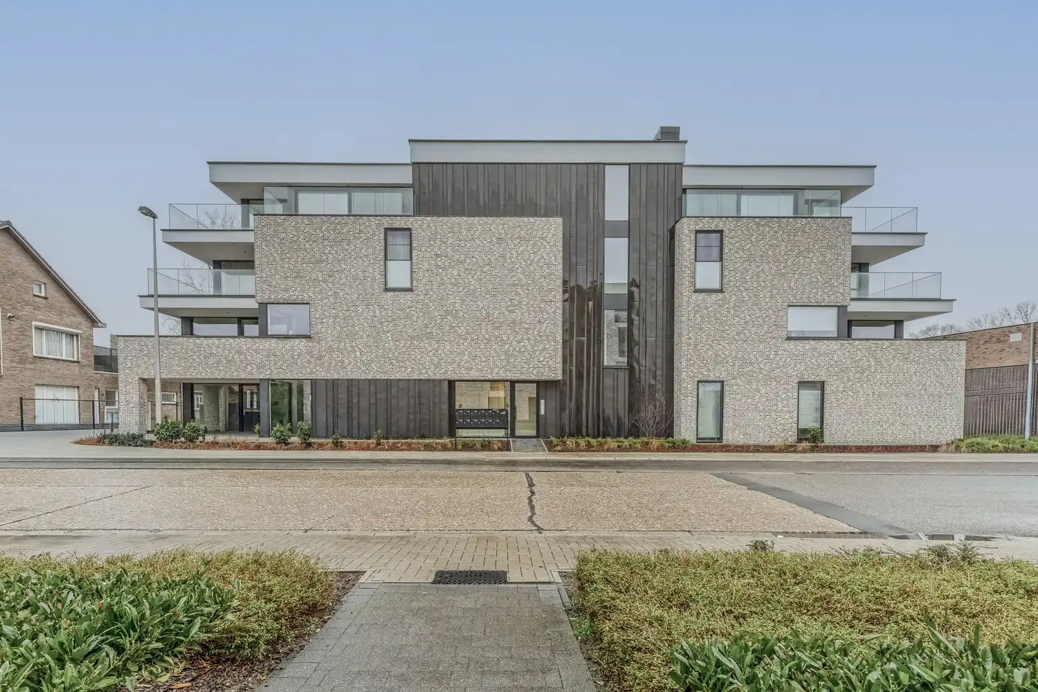 Instapklaar nieuwbouwappartement te huur in Opgrimbie (Maasmechelen) foto {{pictureIndex}}