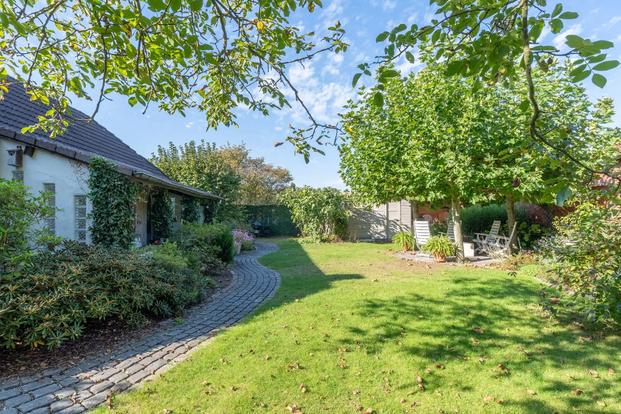 Gunstig gelegen laagbouwwoning met 3 slpks, tuin en garage. foto 3