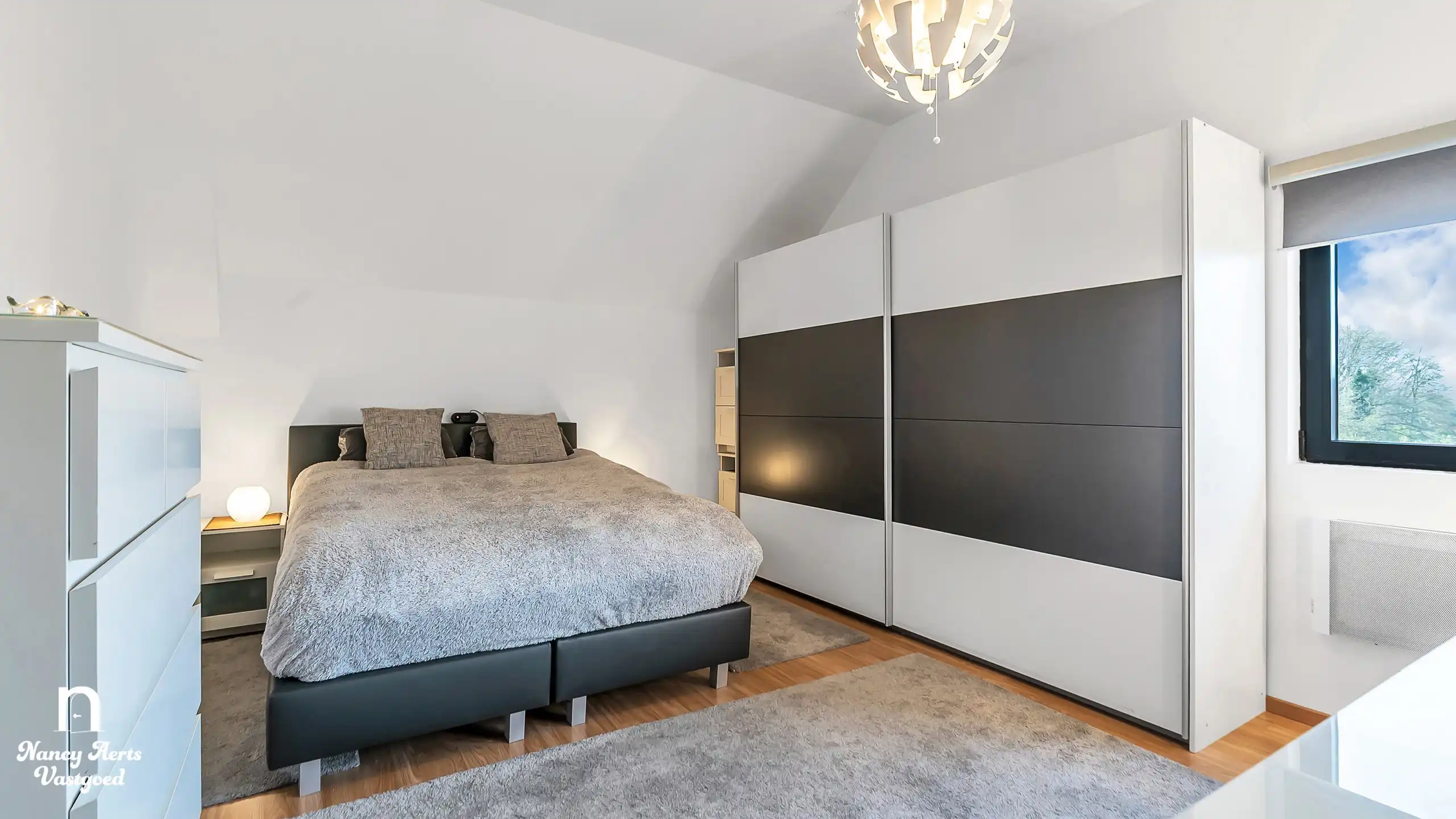 Karaktervolle duplex met loftgevoel en tuin in Zonhoven foto 9