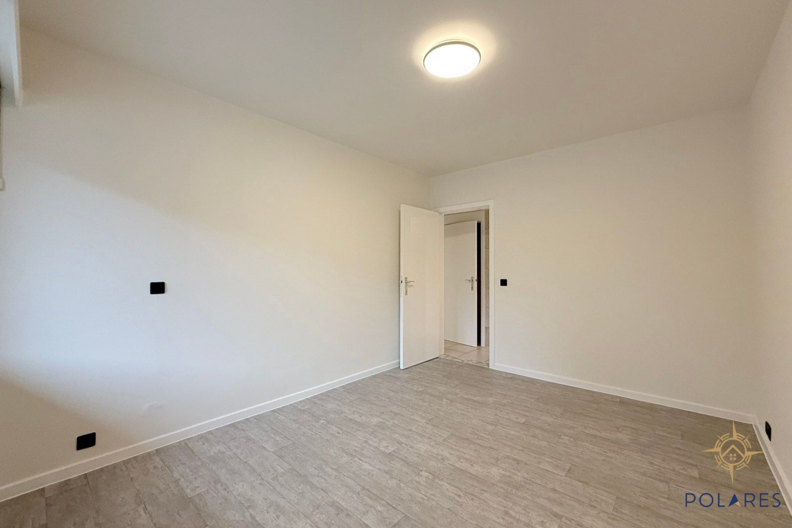 Ruim gelijkvloers appartement in het hartje van Herent foto 11