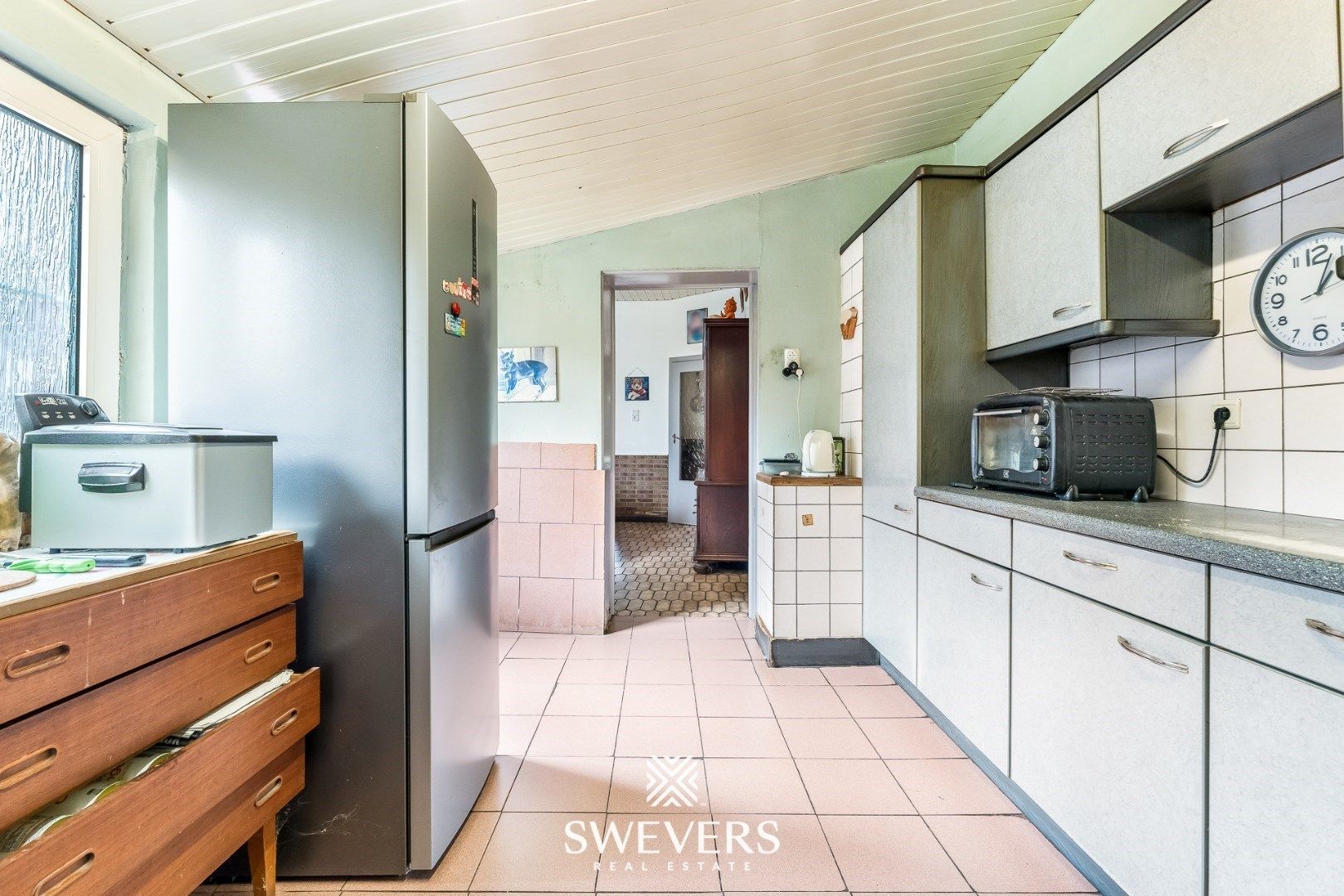 Charmante halfopen woning met renovatiepotentieel in Sint-Truiden foto 14