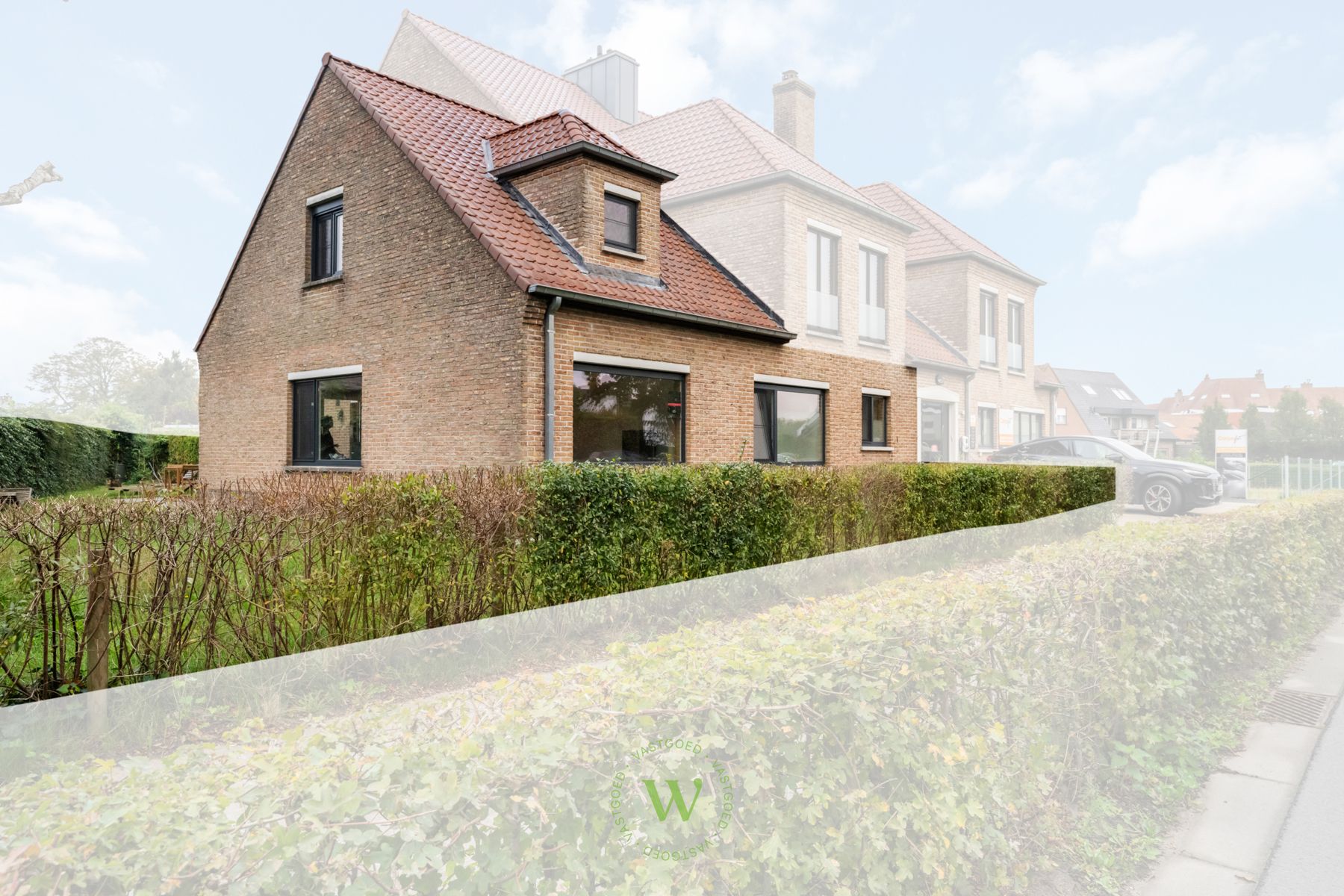 Lichtrijk duplexappartement met tuin en carport in Sijsele foto 2