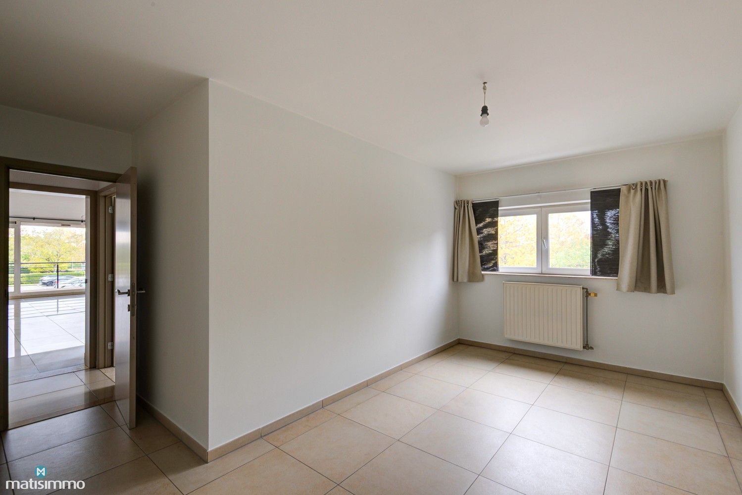 INSTAPKLAAR APPARTEMENT MET 2 SLAAPKAMERS EN AUTOSTAANPLAATS NABIJ STADSCENTRUM BILZEN foto 6