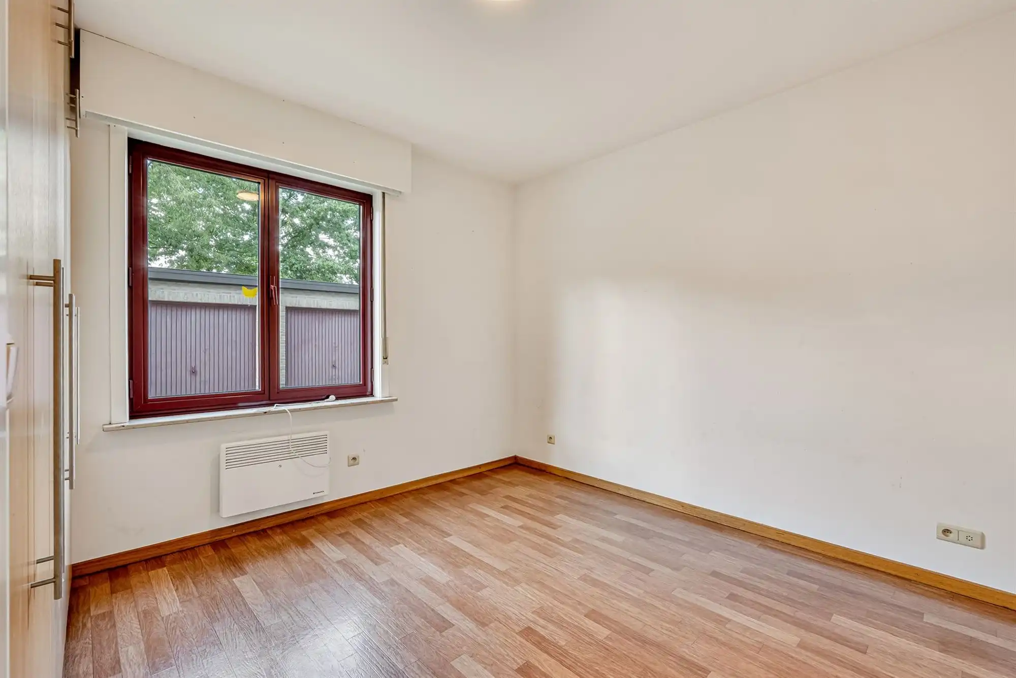 Ruim gelijkvloers appartement met zuidgerichte tuin en garagebox foto 9