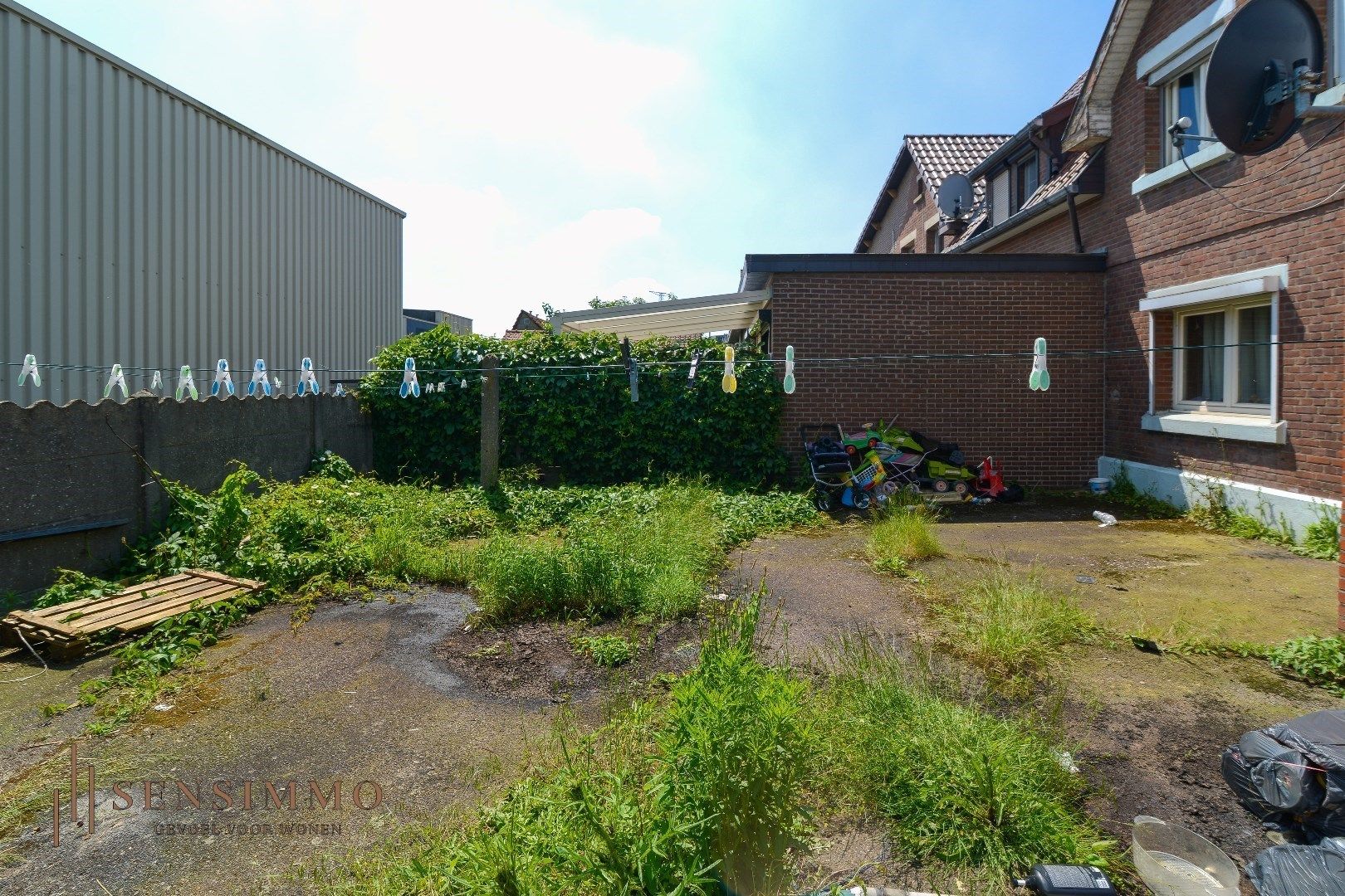 Te renoveren halfopen Tuinwijkwoning met 3 slaapkamers te Genk foto 3