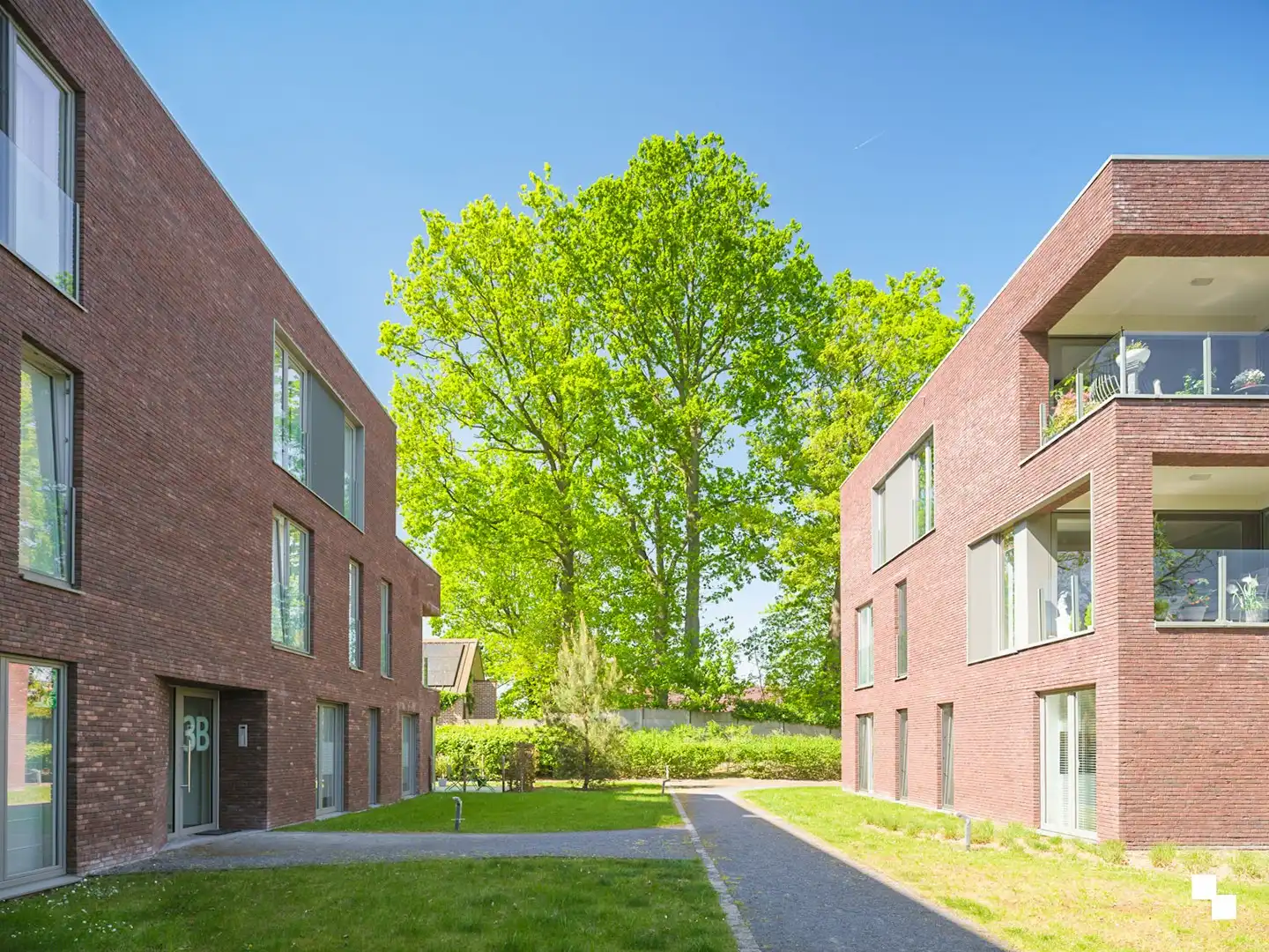 Gelijkvloers appartement omgeven door groen aan de Sint-Denijskerk foto 15