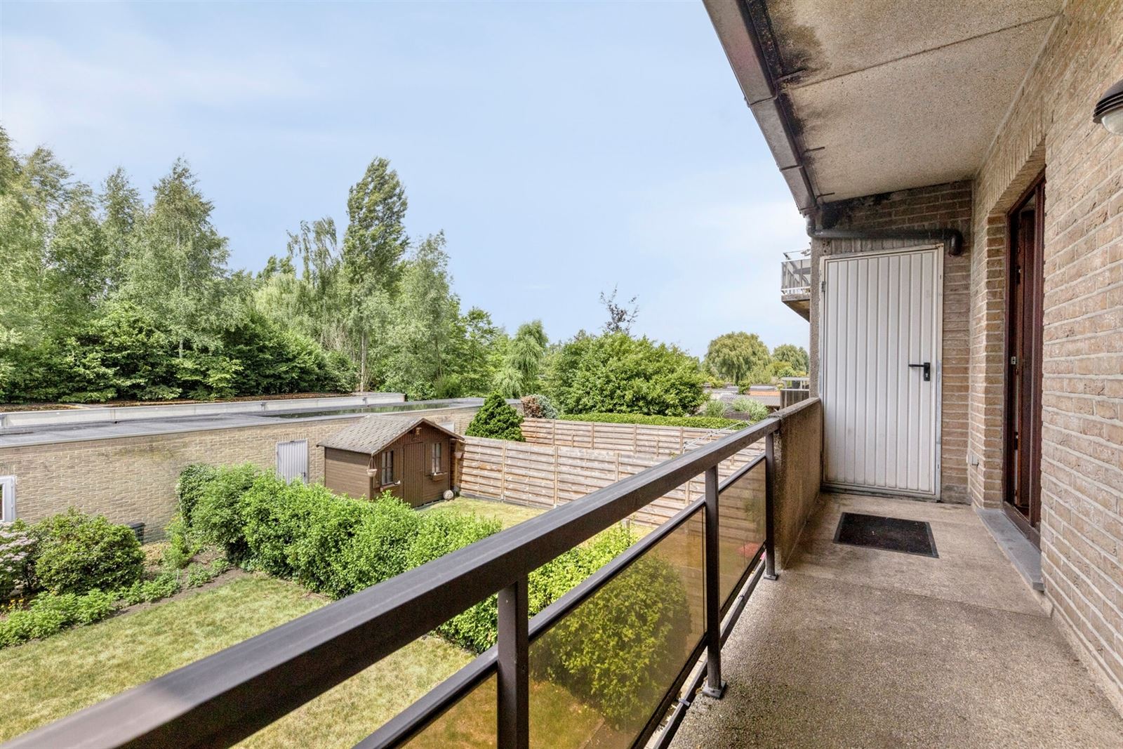 Appartement met terras en bijhorende garagebox foto 18
