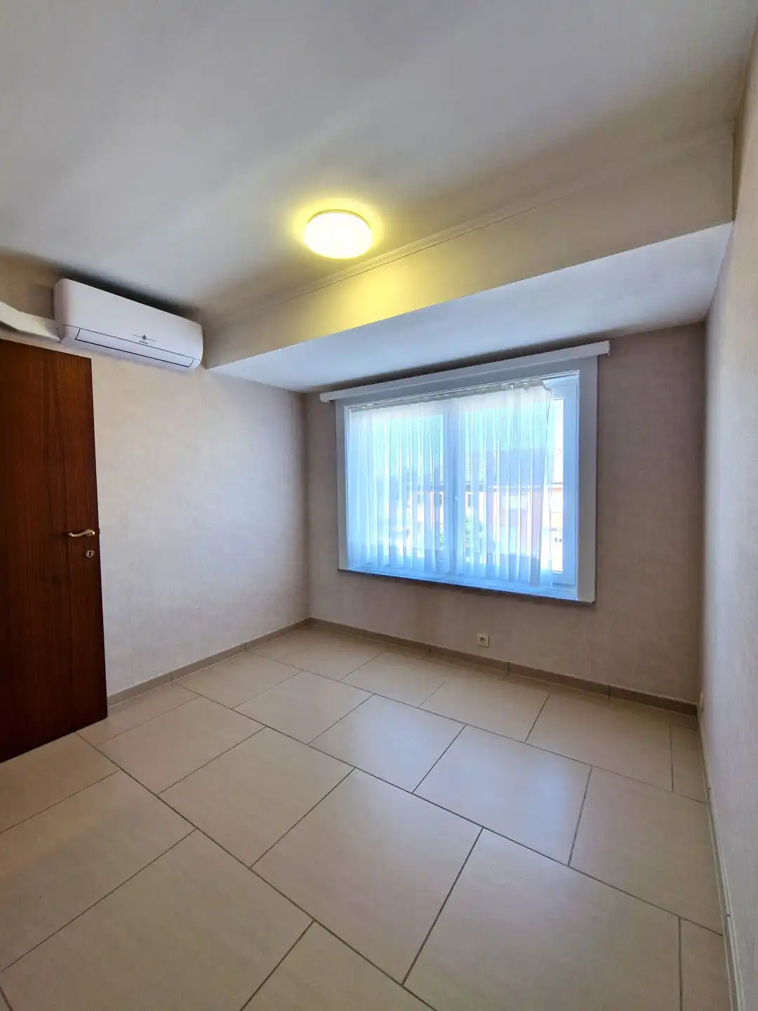 Appartement met 3 slpkmrs, tuin en garage nabij het station foto 7