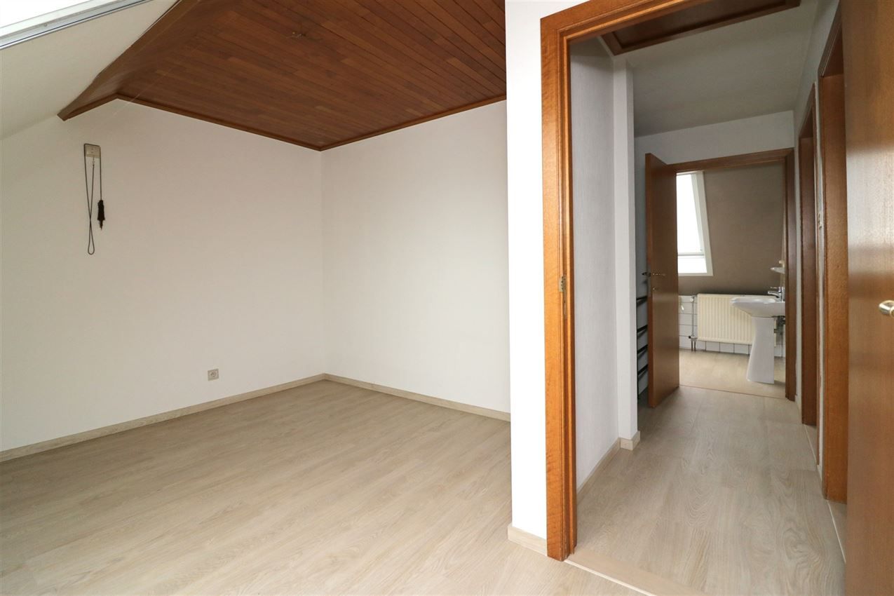 Centraal gelegen appartement met 3 slpk., garage en terras foto 20