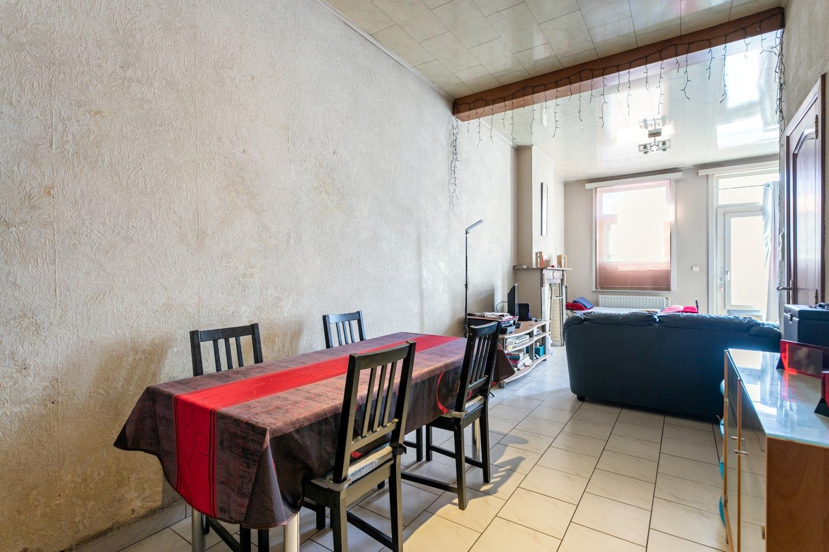 Op te frissen woning met 2 à 3 slpk en tuin te Buizingen. foto 4