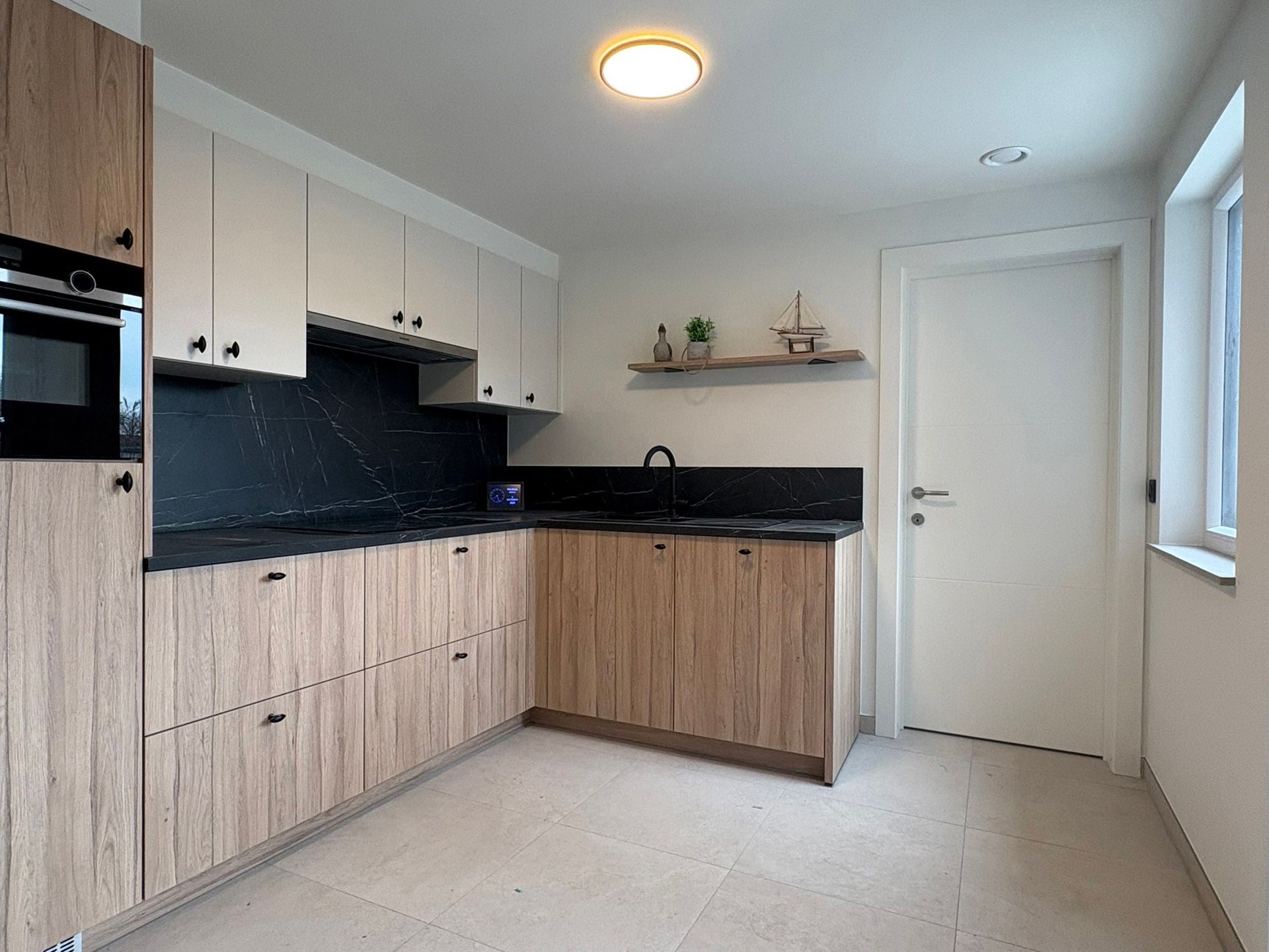 Volledig gerenoveerde gezinswoning met tuin en carport  foto 4