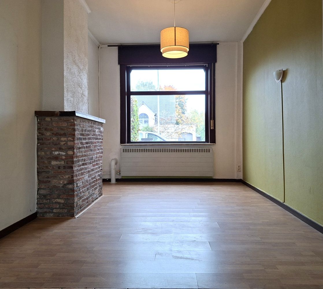 Licht te renoveren woning / 4 slaapkamers en tuin / centrale ligging foto 7