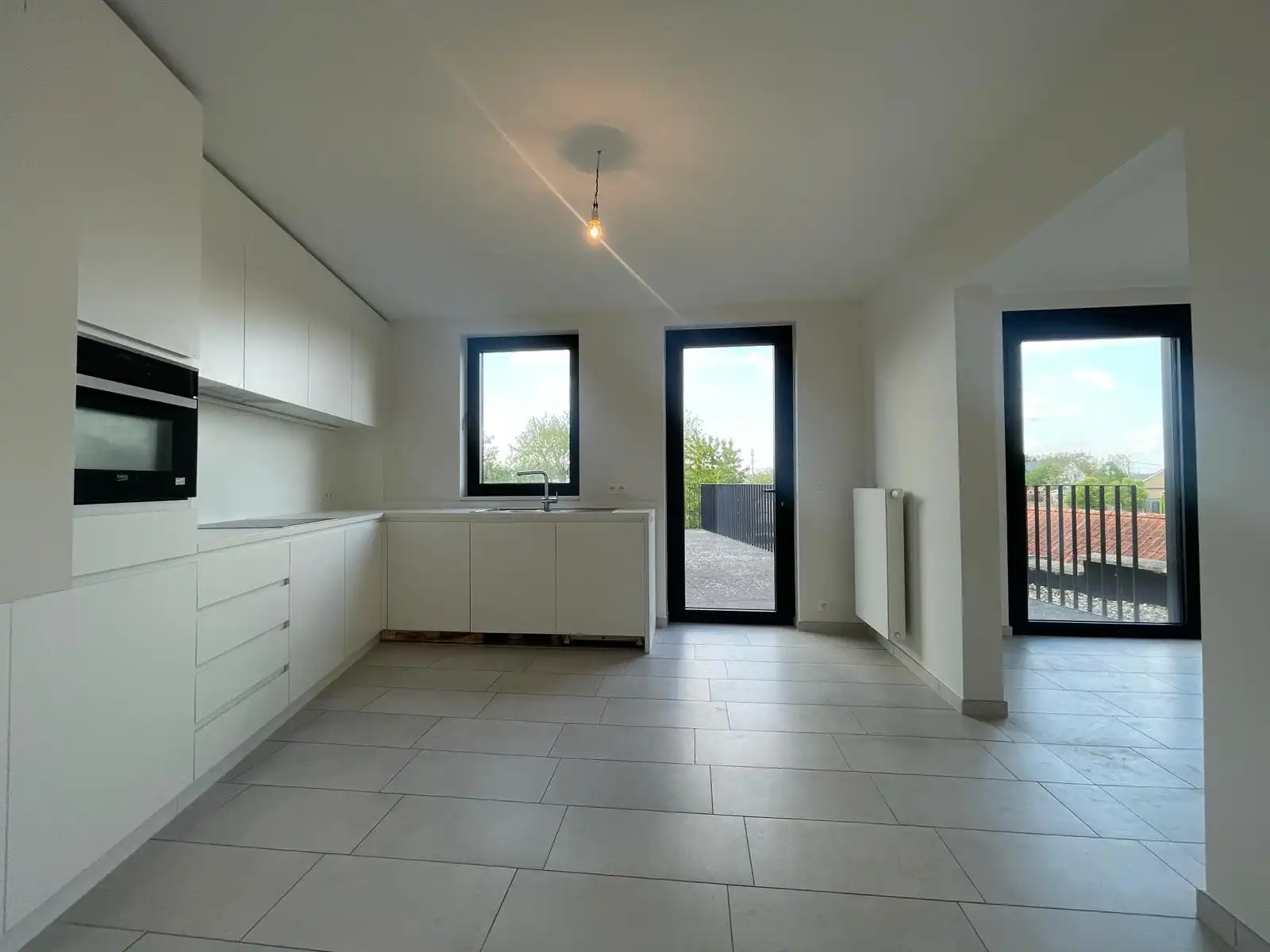Duplex app met 3 slpks en tuin foto 10
