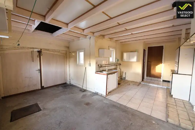 Te renoveren woning met tuin en garage in Sint-Laureins foto 7