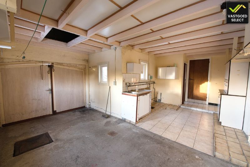 Te renoveren woning met tuin en garage in Sint-Laureins foto 7