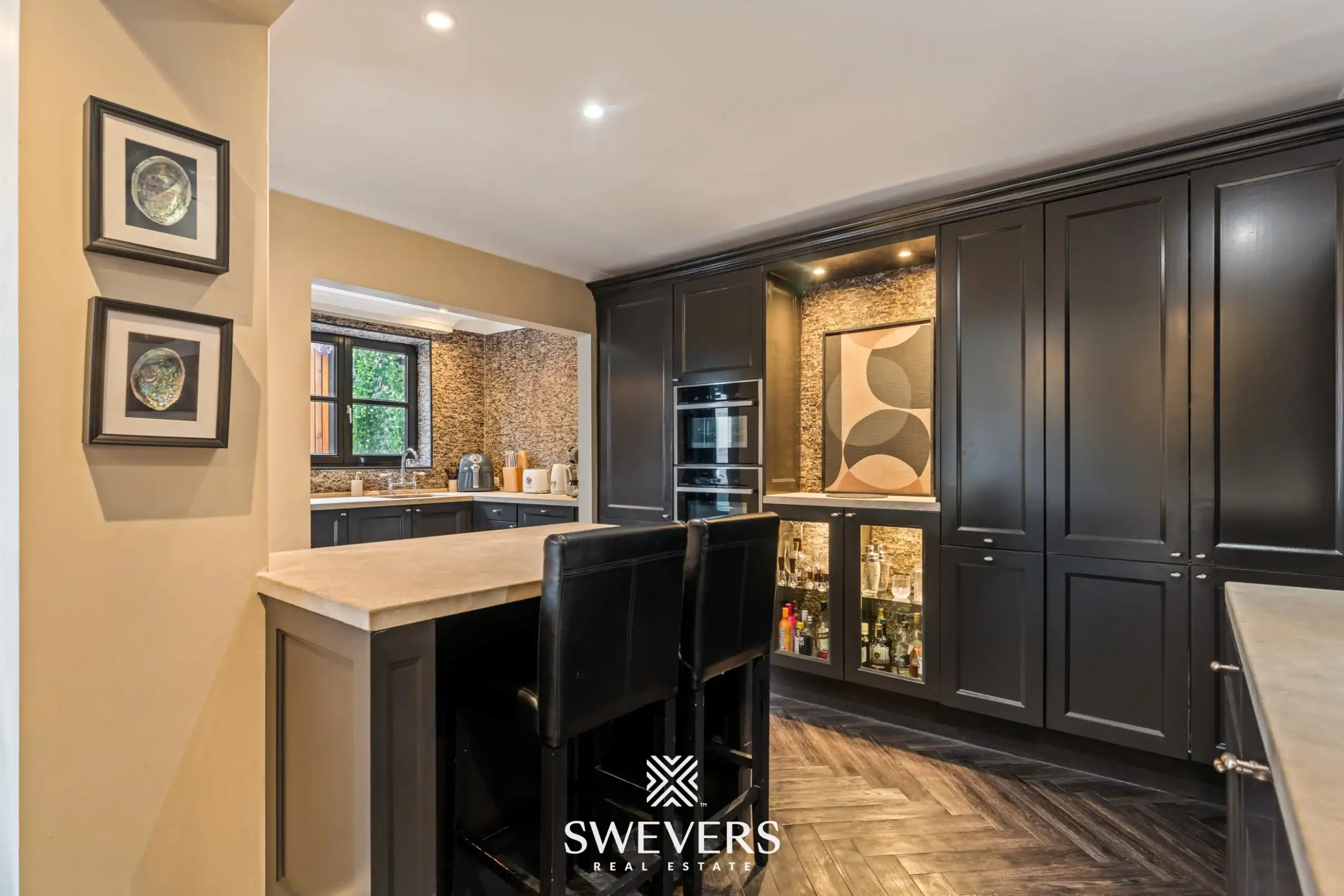 Exclusief gerenoveerde stadswoning met garage en drie terrassen in hartje Hasselt foto 14