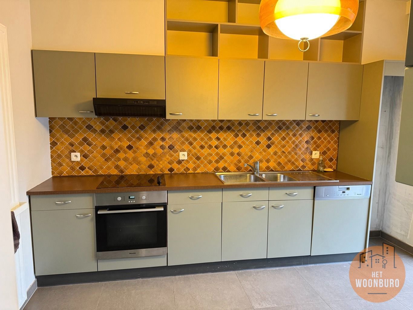 Appartement 1ste verd. met 2 slpks, ruime kelder en garage foto 3