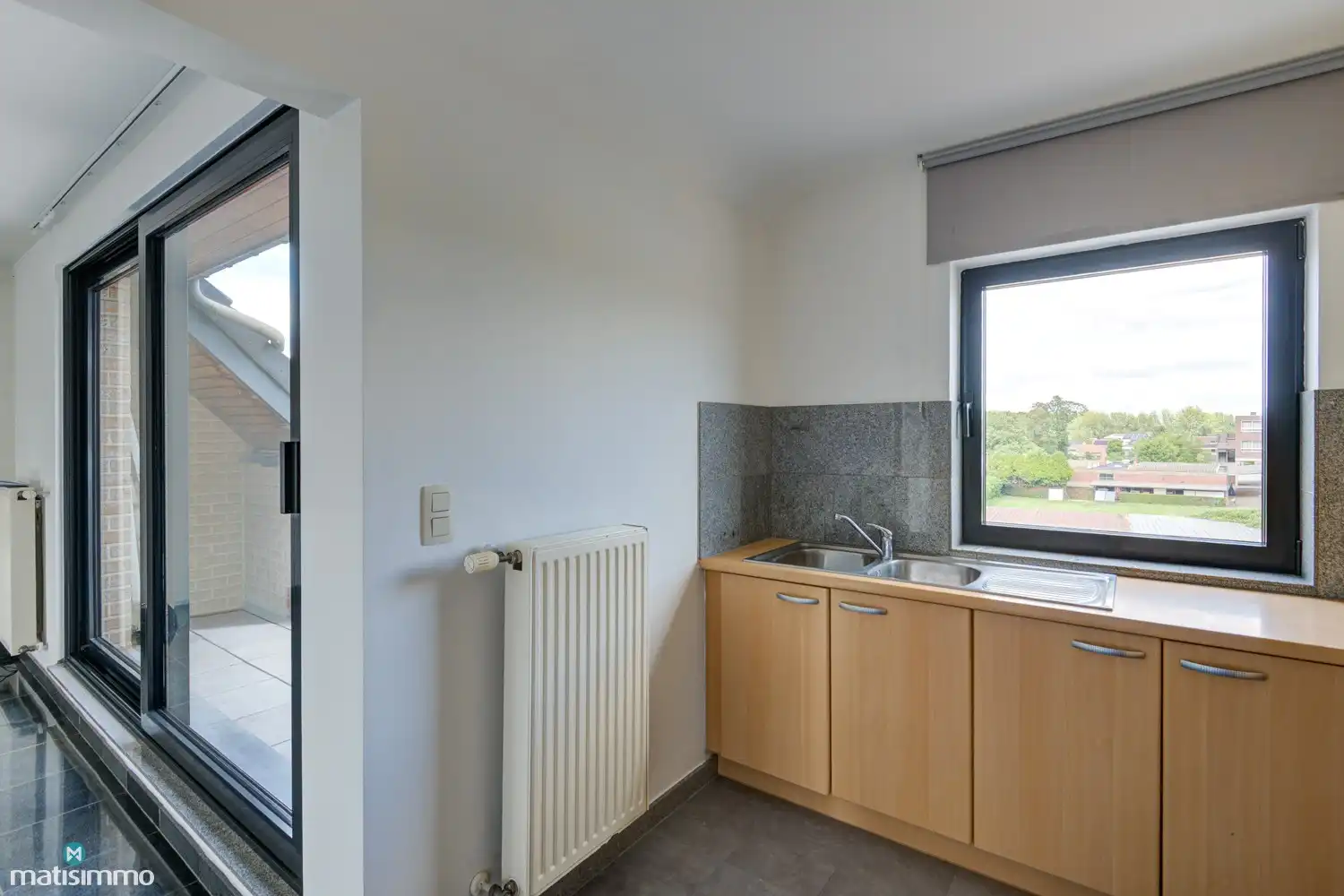 DUPLEXAPPARTEMENT MET 2 SLAAPKAMERS, 2 TERRASSEN EN GARAGEBOX AAN HET CENTRUM VAN BILZEN foto 6