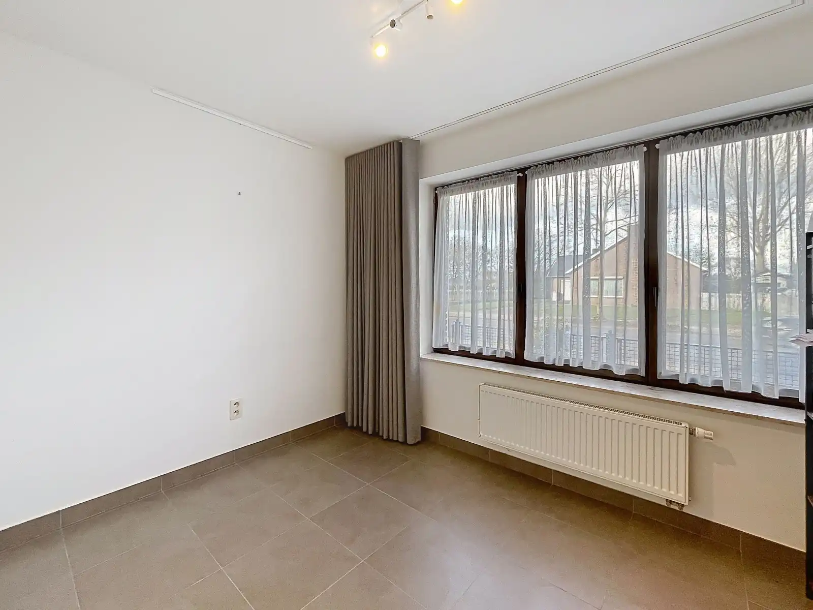 Gelijkvloers appartement met 2 slpk. nabij Kinrooi centrum foto 11