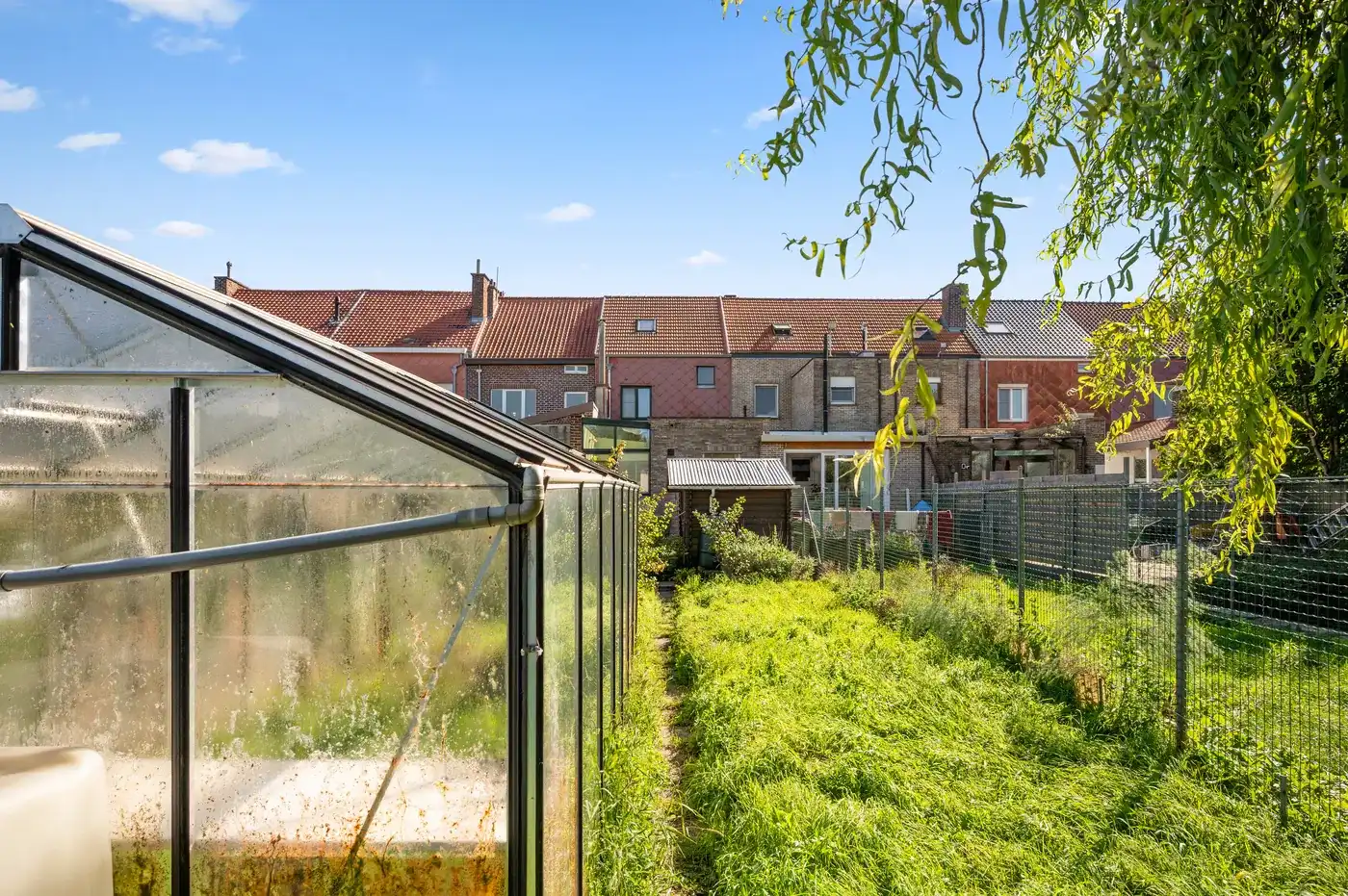Charmante rijwoning met 2 slpk, tuin en parking foto 28