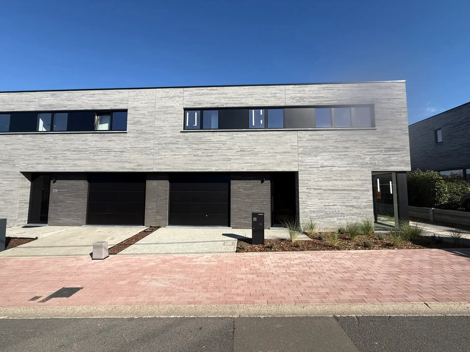 OTTERGEM - NIEUWBOUW BEN-woning in rustige straat. foto {{pictureIndex}}